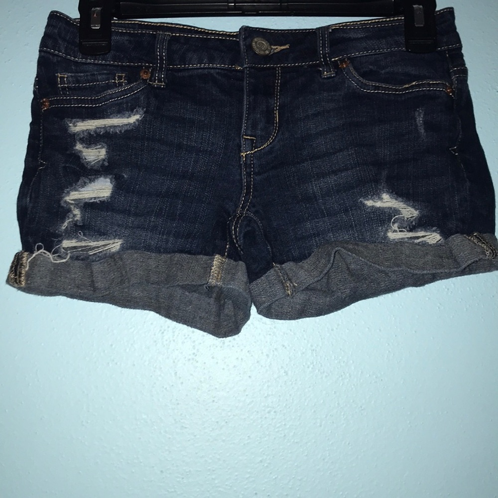 Dark blue ripped jean shorts